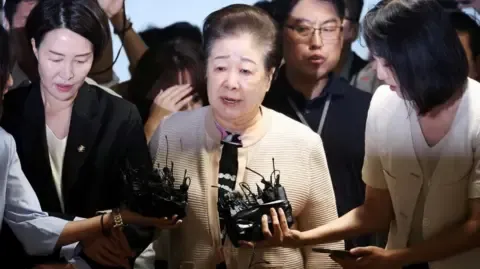 Disputed Religious Leader Rejects Bribery Accusations Involving Ex-South Korea President's Wife